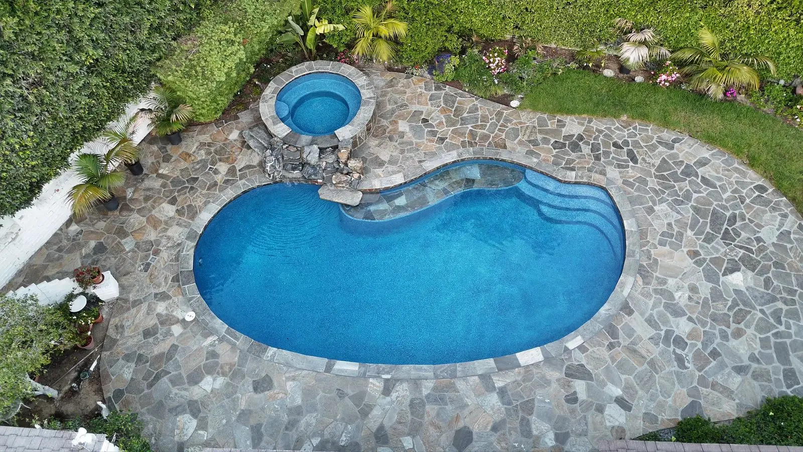 Jazmin Aguas walking through a completed pool remodel in Escondido